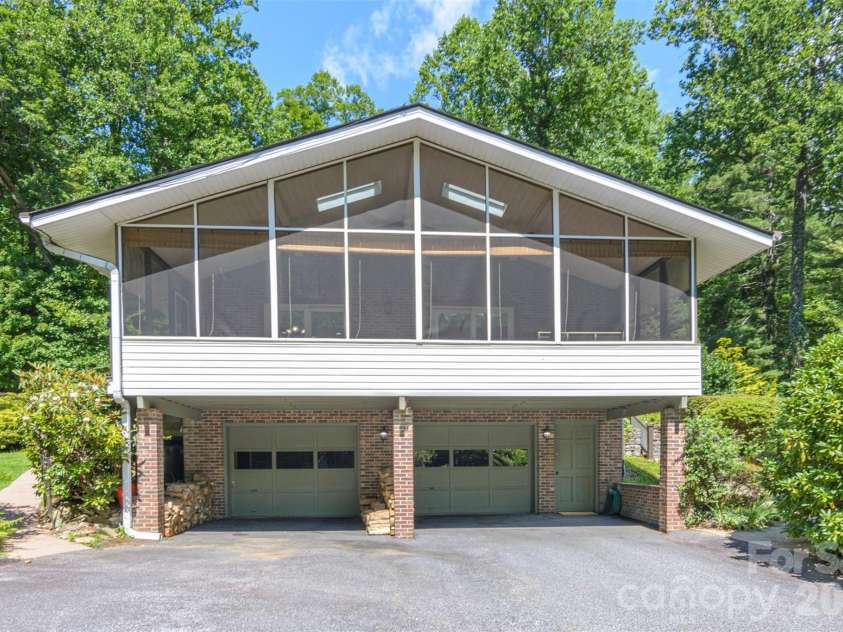 111 Kindy Forest Drive, Hendersonville, NC 28739.  MLS# CAR4398408, YatesRealty ID 37029. Large 2 car garage