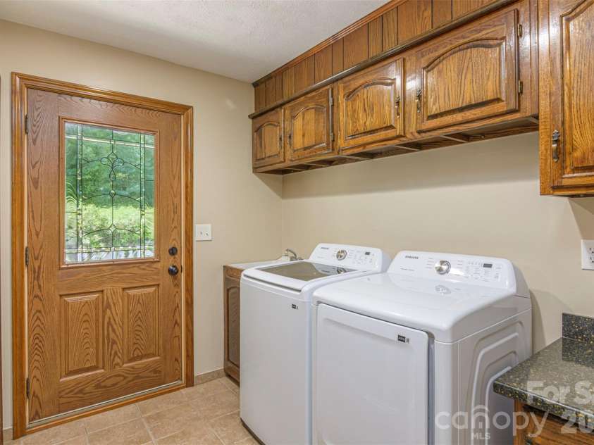 111 Kindy Forest Drive, Hendersonville, NC 28739.  MLS# CAR4398408, YatesRealty ID 37029. NOTE:  This Washer and Dryer have been replaced
