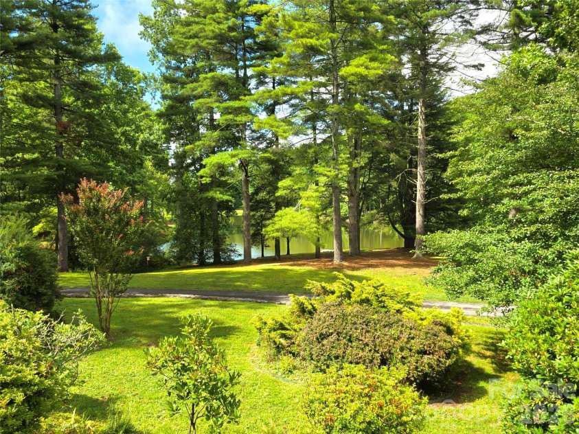 111 Kindy Forest Drive, Hendersonville, NC 28739.  MLS# CAR4398408, YatesRealty ID 37029. Total Tranquility!