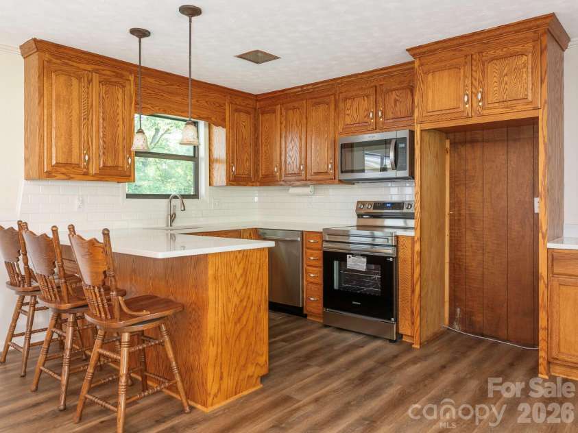 4531 Rocky River Road, Concord, NC 28027.  MLS# CAR4399344, YatesRealty ID 37030. Updated kitchen