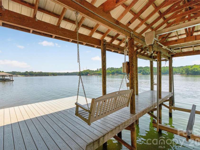 3225 Lake Pointe Drive, Belmont, NC 28012.  MLS# CAR4399291, YatesRealty ID 37031. Covered trex deck with swing