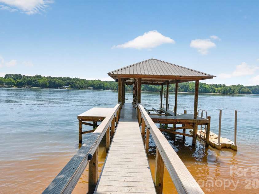 3225 Lake Pointe Drive, Belmont, NC 28012.  MLS# CAR4399291, YatesRealty ID 37031. Imagine waking to this...your lakefront retreat!
