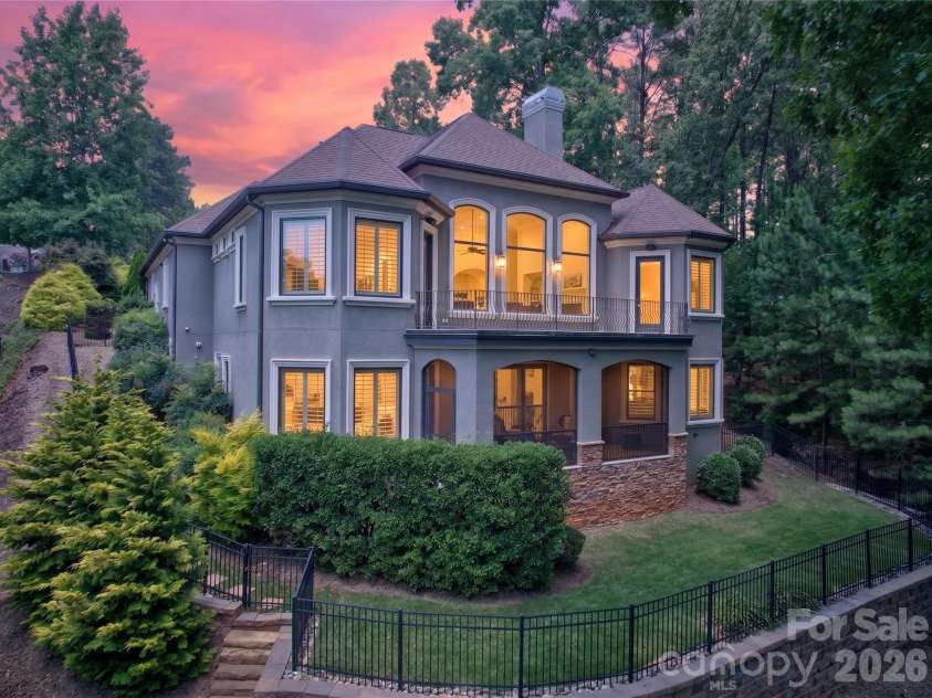 3225 Lake Pointe Drive, Belmont, NC 28012.  MLS# CAR4399291, YatesRealty ID 37031. Look at all the windows facing the water!