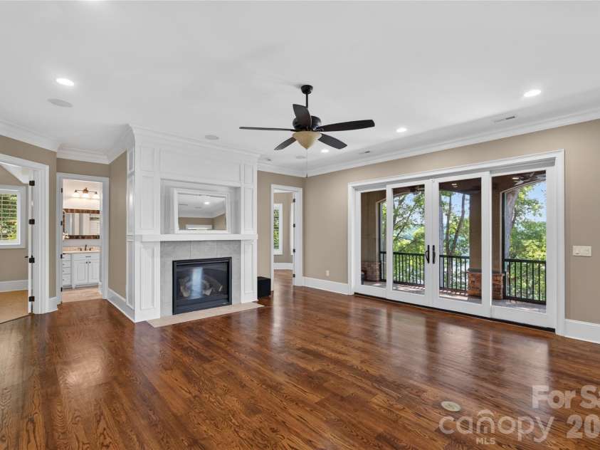 3225 Lake Pointe Drive, Belmont, NC 28012.  MLS# CAR4399291, YatesRealty ID 37031. Lower Level FP in Family Room