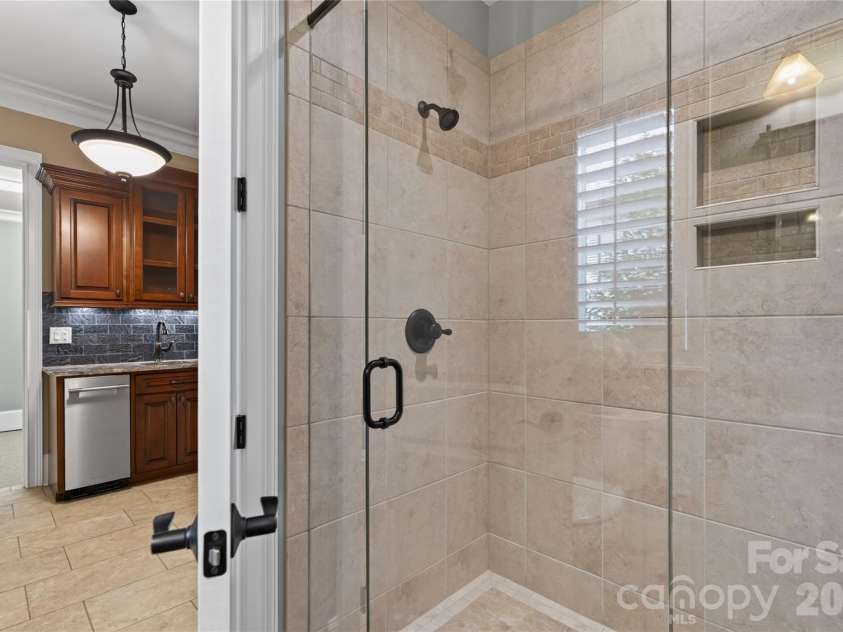 3225 Lake Pointe Drive, Belmont, NC 28012.  MLS# CAR4399291, YatesRealty ID 37031. Lower Level Guest Walk in shower