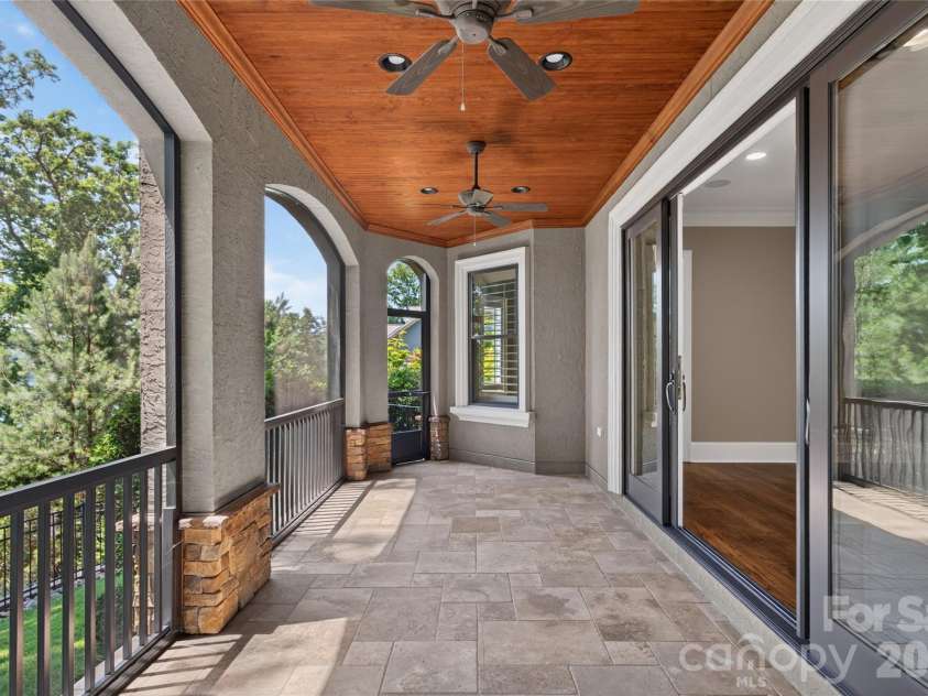 3225 Lake Pointe Drive, Belmont, NC 28012.  MLS# CAR4399291, YatesRealty ID 37031. Lower level Spacious screened in porch