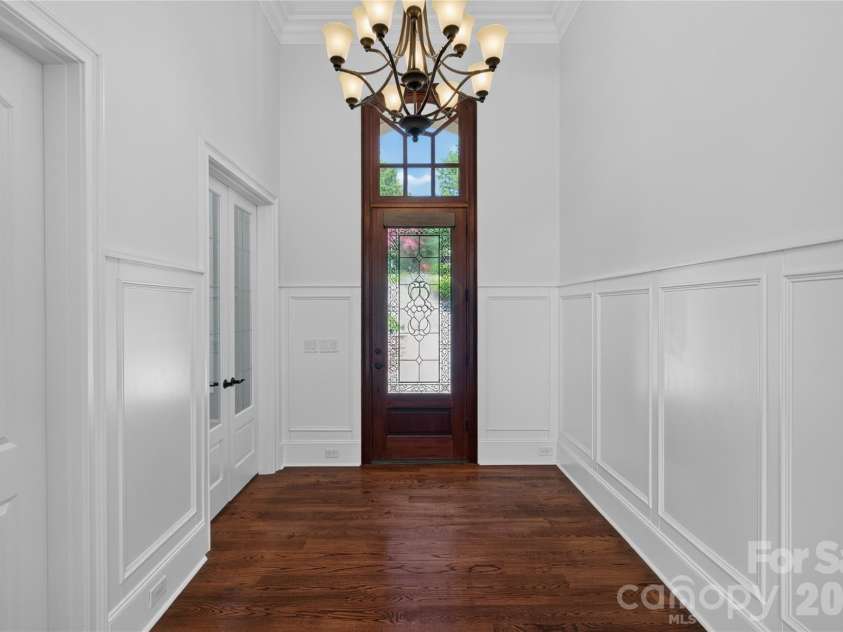 3225 Lake Pointe Drive, Belmont, NC 28012.  MLS# CAR4399291, YatesRealty ID 37031. Mahogany front door has motorized shade with remote