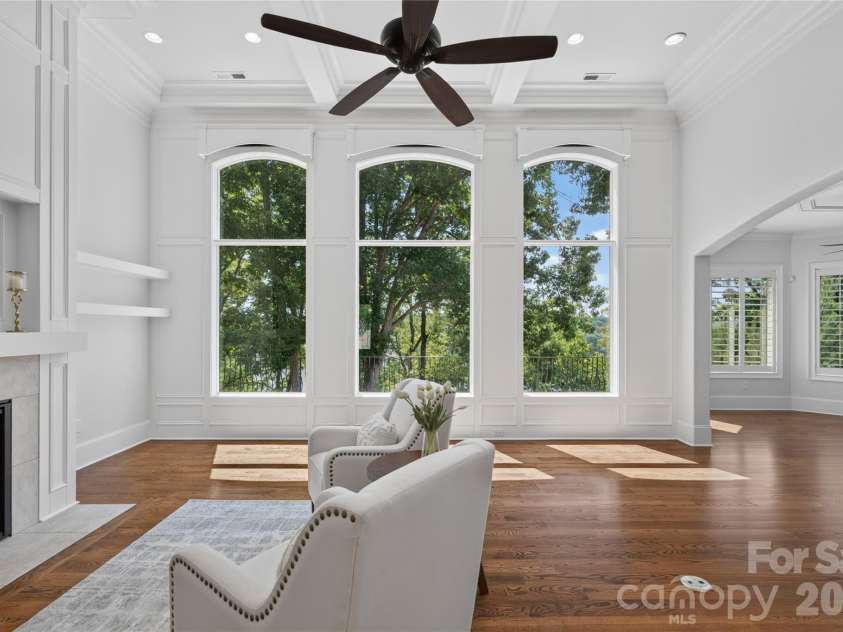 3225 Lake Pointe Drive, Belmont, NC 28012.  MLS# CAR4399291, YatesRealty ID 37031. Wall of windows have motorized shades in GR with remote
