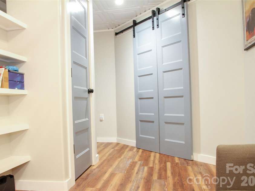 7947 Lakeview Drive, Denver, NC 28037.  MLS# CAR4396395, YatesRealty ID 37043. Basement Hallway