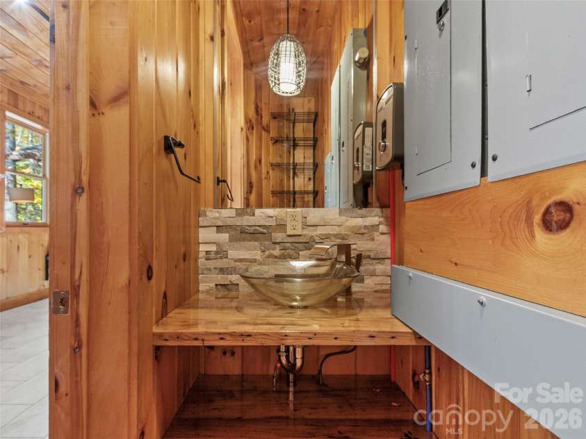 191 Fork Road, Burnsville, NC 28714.  MLS# CAR4355086, YatesRealty ID 37045. Guest house half bath