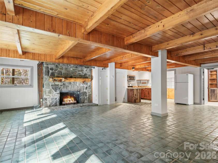 191 Fork Road, Burnsville, NC 28714.  MLS# CAR4355086, YatesRealty ID 37045. Main house basement