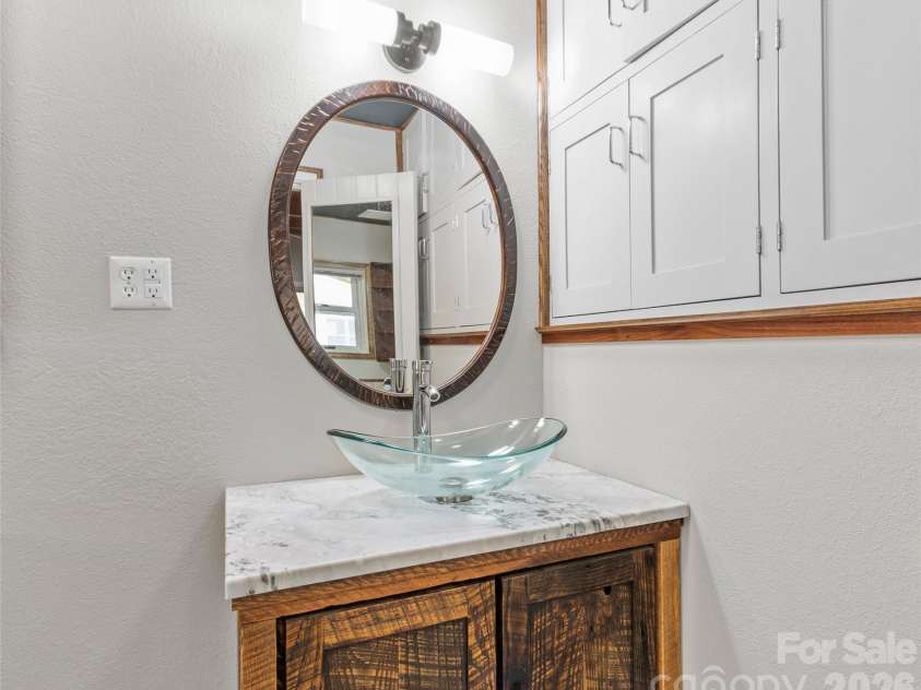 191 Fork Road, Burnsville, NC 28714.  MLS# CAR4355086, YatesRealty ID 37045. Main house bathroom
