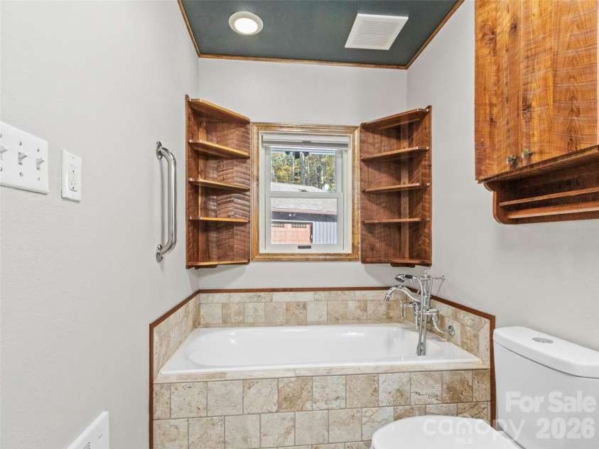 191 Fork Road, Burnsville, NC 28714.  MLS# CAR4355086, YatesRealty ID 37045. Main house bathroom