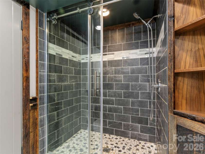 191 Fork Road, Burnsville, NC 28714.  MLS# CAR4355086, YatesRealty ID 37045. Main house bathroom in basement