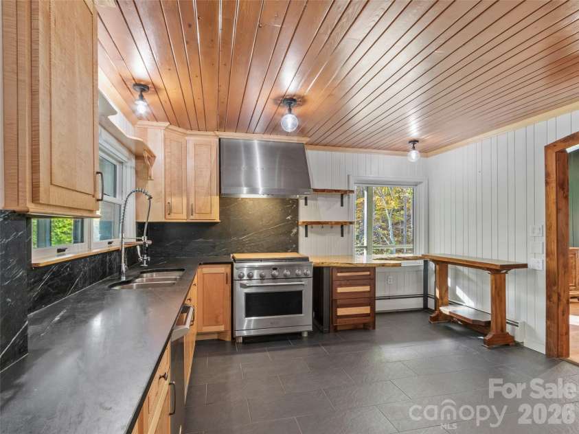 191 Fork Road, Burnsville, NC 28714.  MLS# CAR4355086, YatesRealty ID 37045. Main House Kitchen