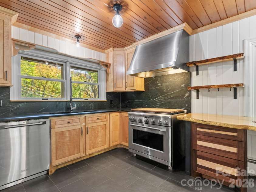 191 Fork Road, Burnsville, NC 28714.  MLS# CAR4355086, YatesRealty ID 37045. Main House Kitchen