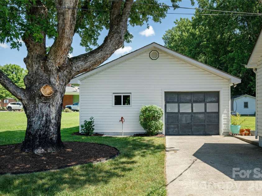 419 Big Bend Road, Brevard, NC 28712.  MLS# CAR4398775, YatesRealty ID 37046. Detached Garage with Shop