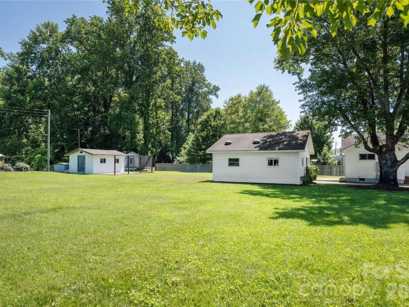 419 Big Bend Road, Brevard, NC 28712.  MLS# CAR4398775, YatesRealty ID 37046. Grow A Garden