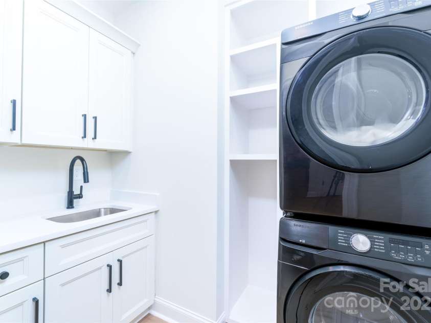 150 Forest Creek Drive, Statesville, NC 28625.  MLS# CAR4286307, YatesRealty ID 3705. Upstairs Laundry Room