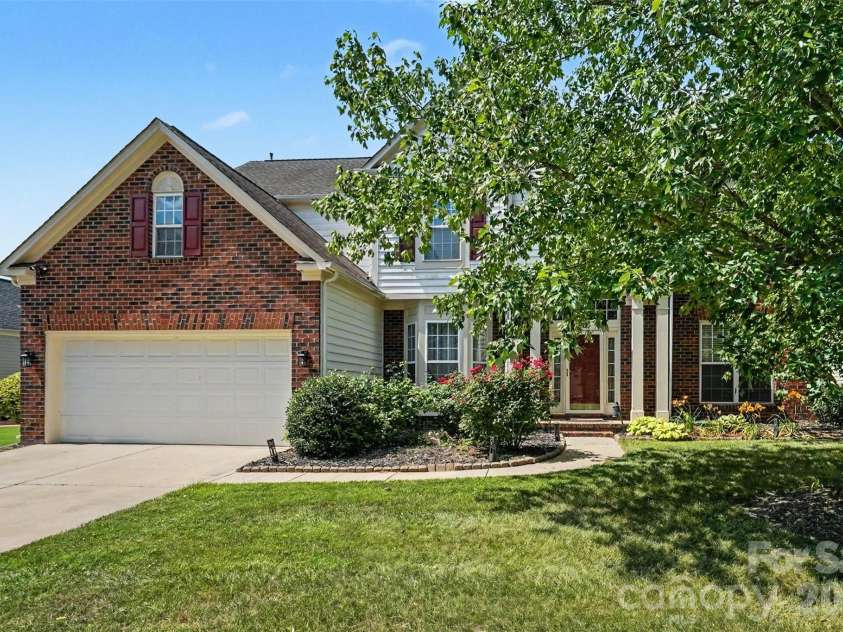 8021 Pelorus Lane, Charlotte, NC 28269.  MLS# CAR4394825, YatesRealty ID 37050. Front Exterior