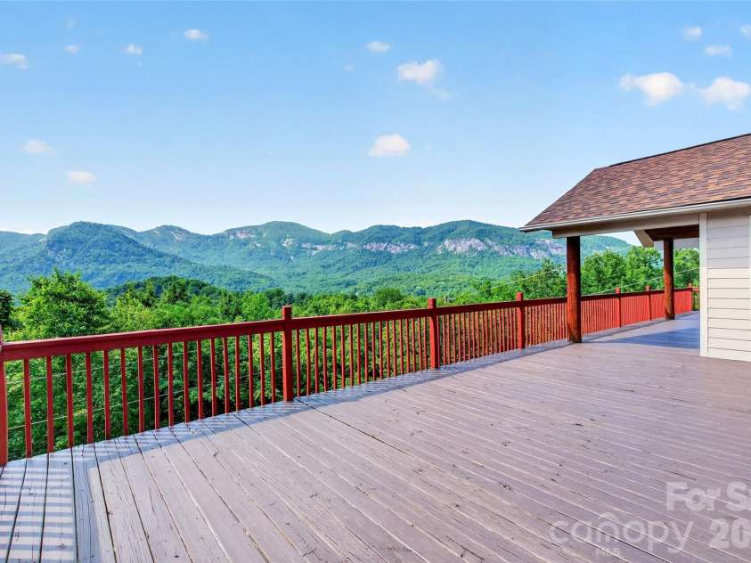227 Sidney Lanier Drive, Lake Lure, NC 28746.  MLS# CAR4400110, YatesRealty ID 37052. Expansive deck