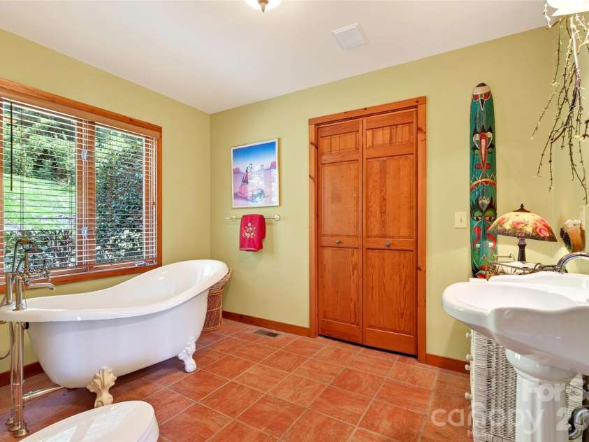227 Sidney Lanier Drive, Lake Lure, NC 28746.  MLS# CAR4400110, YatesRealty ID 37052. Large primary bath
