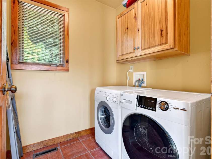 227 Sidney Lanier Drive, Lake Lure, NC 28746.  MLS# CAR4400110, YatesRealty ID 37052. Laundry Room