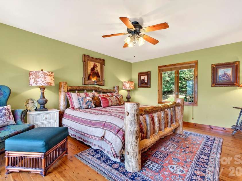 227 Sidney Lanier Drive, Lake Lure, NC 28746.  MLS# CAR4400110, YatesRealty ID 37052. Spacious primary Suite