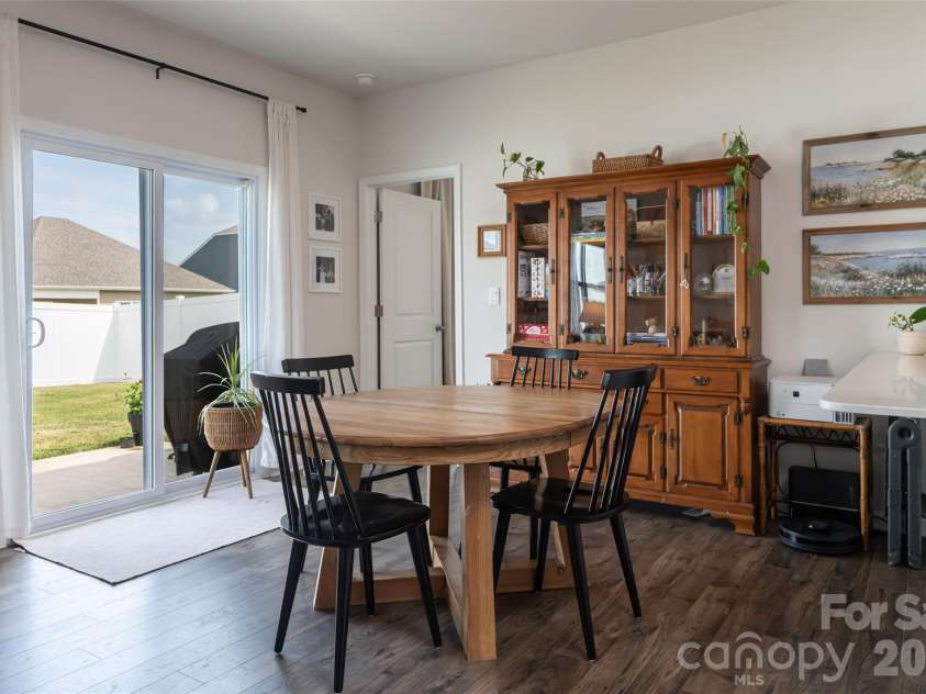 197 Wheatfield Road, Fletcher, NC 28732.  MLS# CAR4398770, YatesRealty ID 37057. Dining Area to back patio