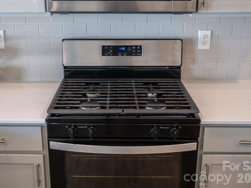 197 Wheatfield Road, Fletcher, NC 28732.  MLS# CAR4398770, YatesRealty ID 37057. Gas range