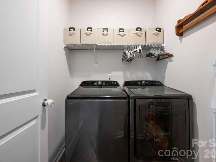 197 Wheatfield Road, Fletcher, NC 28732.  MLS# CAR4398770, YatesRealty ID 37057. Laundry room with extra storage closet