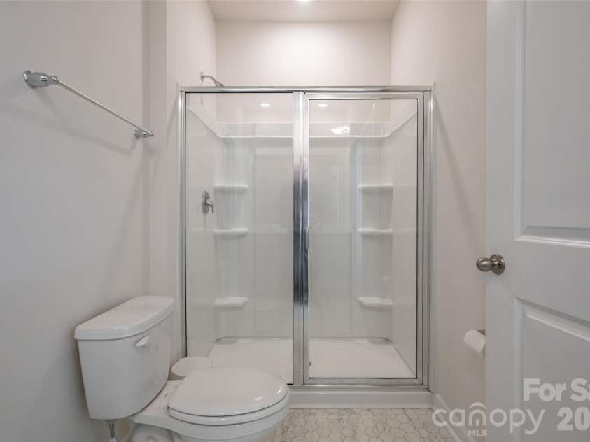 197 Wheatfield Road, Fletcher, NC 28732.  MLS# CAR4398770, YatesRealty ID 37057. Primary bath