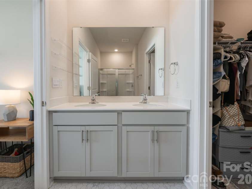 197 Wheatfield Road, Fletcher, NC 28732.  MLS# CAR4398770, YatesRealty ID 37057. Primary bath with double vanity