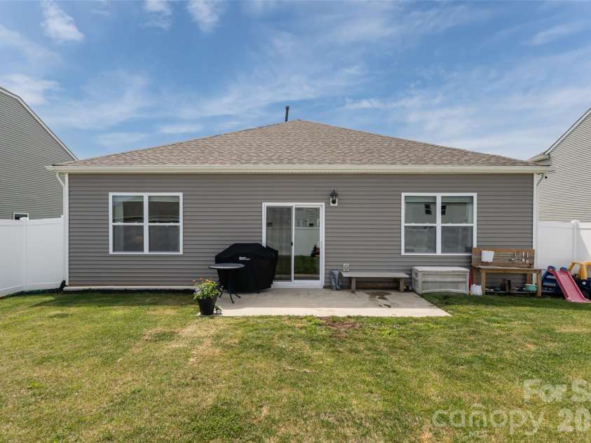 197 Wheatfield Road, Fletcher, NC 28732.  MLS# CAR4398770, YatesRealty ID 37057. Rear of home
