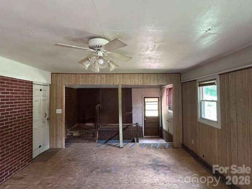 169 Double Island Road, Burnsville, NC 28714.  MLS# CAR4396716, YatesRealty ID 37060. Addition exit to rear of home