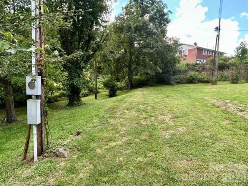 169 Double Island Road, Burnsville, NC 28714.  MLS# CAR4396716, YatesRealty ID 37060. Electric meter Base and Water line