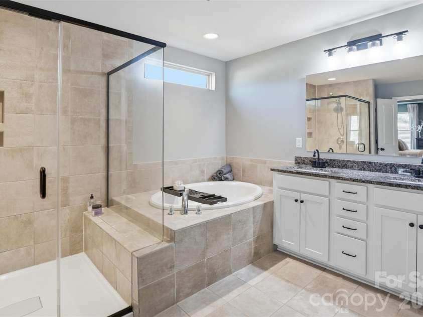 10022 Wrigley Drive, Charlotte, NC 28273.  MLS# CAR4400903, YatesRealty ID 37064. Double vanity with granite Counters