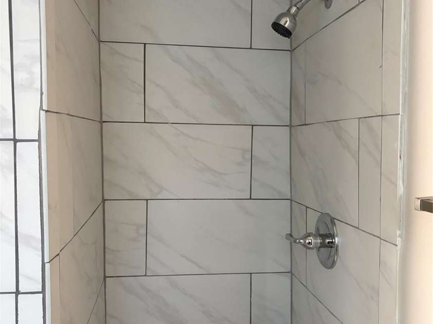 315 Parkview Avenue, Concord, NC 28025.  MLS# CAR4400555, YatesRealty ID 37066. Tiled Shower