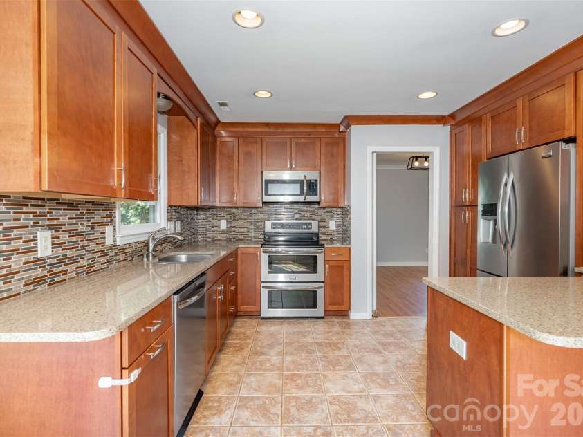 2213 Century Oaks Lane, Charlotte, NC 28262.  MLS# CAR4395441, YatesRealty ID 37068. 
