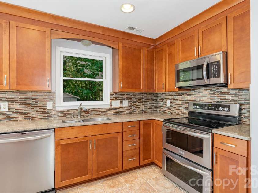 2213 Century Oaks Lane, Charlotte, NC 28262.  MLS# CAR4395441, YatesRealty ID 37068. 