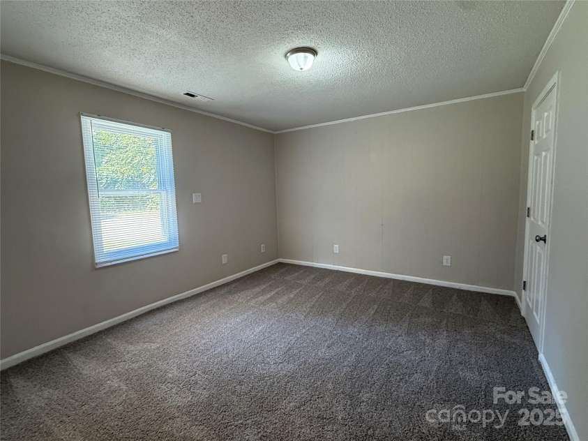 1555 Collinston Drive, Gastonia, NC 28052.  MLS# CAR4304198, YatesRealty ID 3707. Primary Bedroom