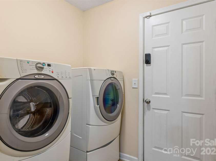 3005 Woodbluff Drive, Greensboro, NC 27406.  MLS# CAR4224024, YatesRealty ID 3707. Laundry- outside of garage