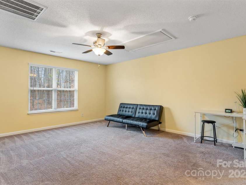 3005 Woodbluff Drive, Greensboro, NC 27406.  MLS# CAR4224024, YatesRealty ID 3707. Second level bonus room