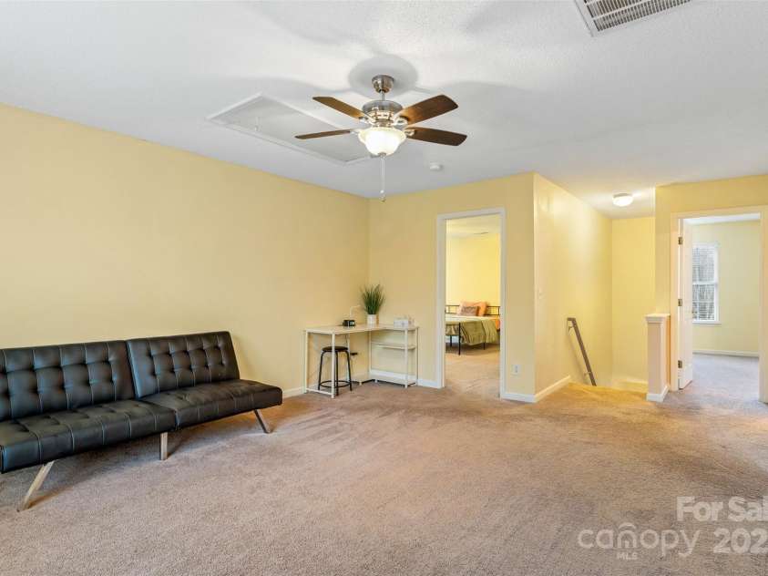 3005 Woodbluff Drive, Greensboro, NC 27406.  MLS# CAR4224024, YatesRealty ID 3707. Second level bonus room