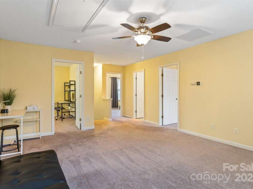 3005 Woodbluff Drive, Greensboro, NC 27406.  MLS# CAR4224024, YatesRealty ID 3707. Second level bonus room