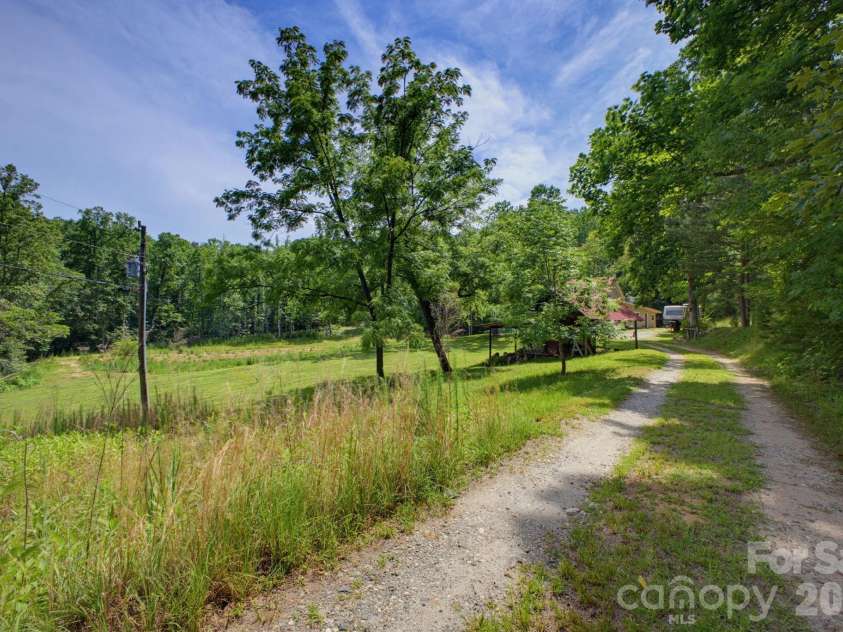 1239 McGuinn Road, Mill Spring, NC 28756.  MLS# CAR4387532, YatesRealty ID 37073. 