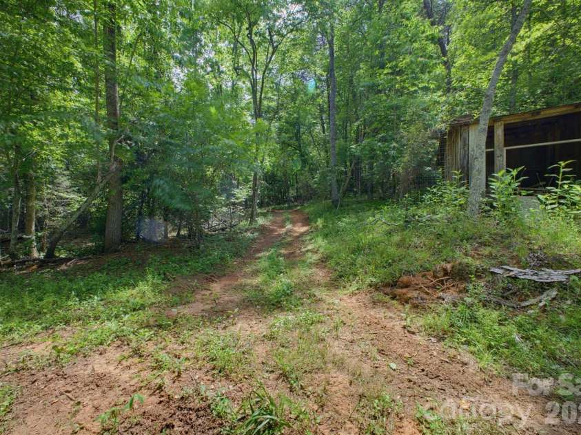 1239 McGuinn Road, Mill Spring, NC 28756.  MLS# CAR4387532, YatesRealty ID 37073. 