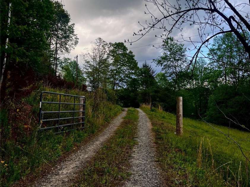 1239 McGuinn Road, Mill Spring, NC 28756.  MLS# CAR4387532, YatesRealty ID 37073. 