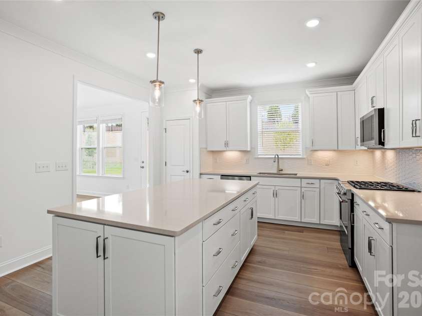 2637 Headwind Court, Belmont, NC 28012.  MLS# CAR4403051, YatesRealty ID 37075. Sunroom off the kitchen