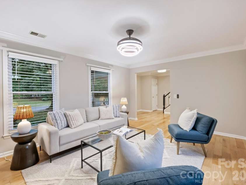 2500 Crescent Knoll Drive, Matthews, NC 28105.  MLS# CAR4399861, YatesRealty ID 37086. Front Living Room